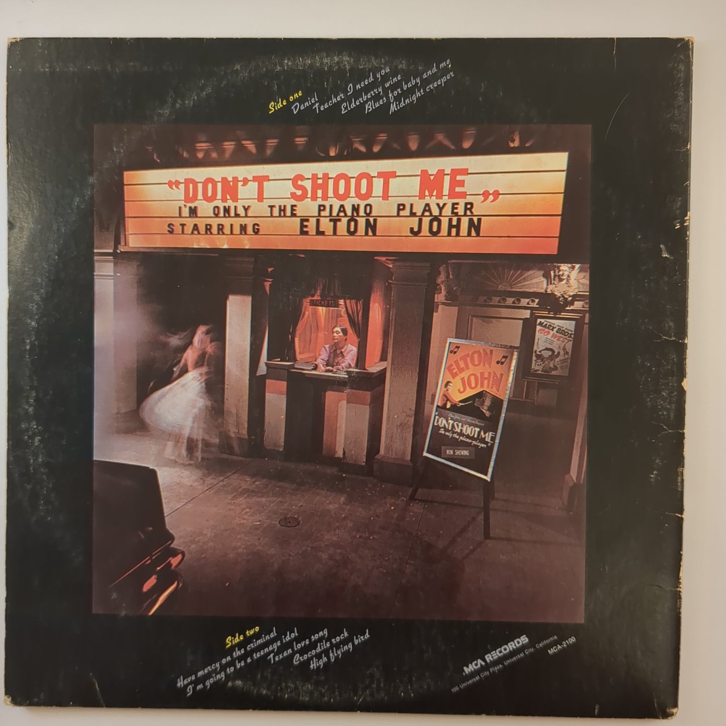 Elton John - 'Don't Shoot Me I'm Only The Piano Player'